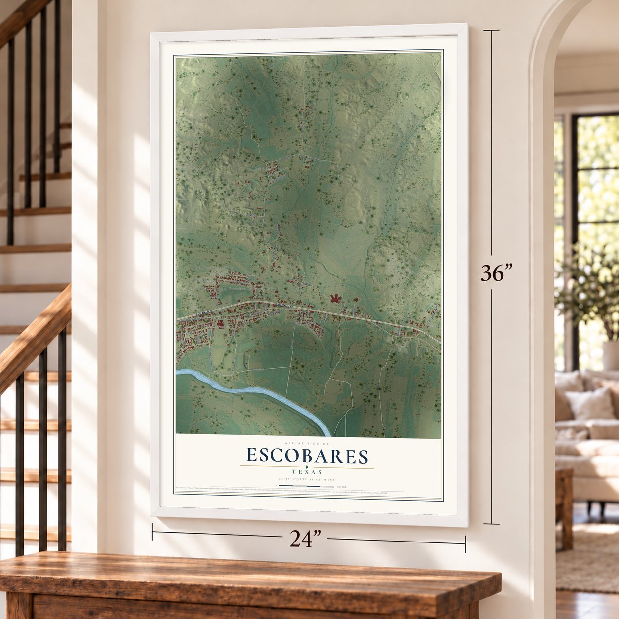Escobares, Texas map, 24 x 36 inch print in a white frame by a staircase