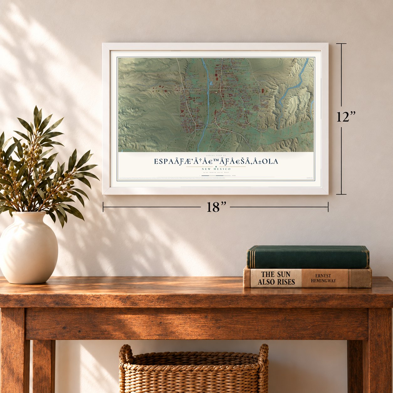 Española, New Mexico map, 12 x 18 inch print in a white frame in an entryway