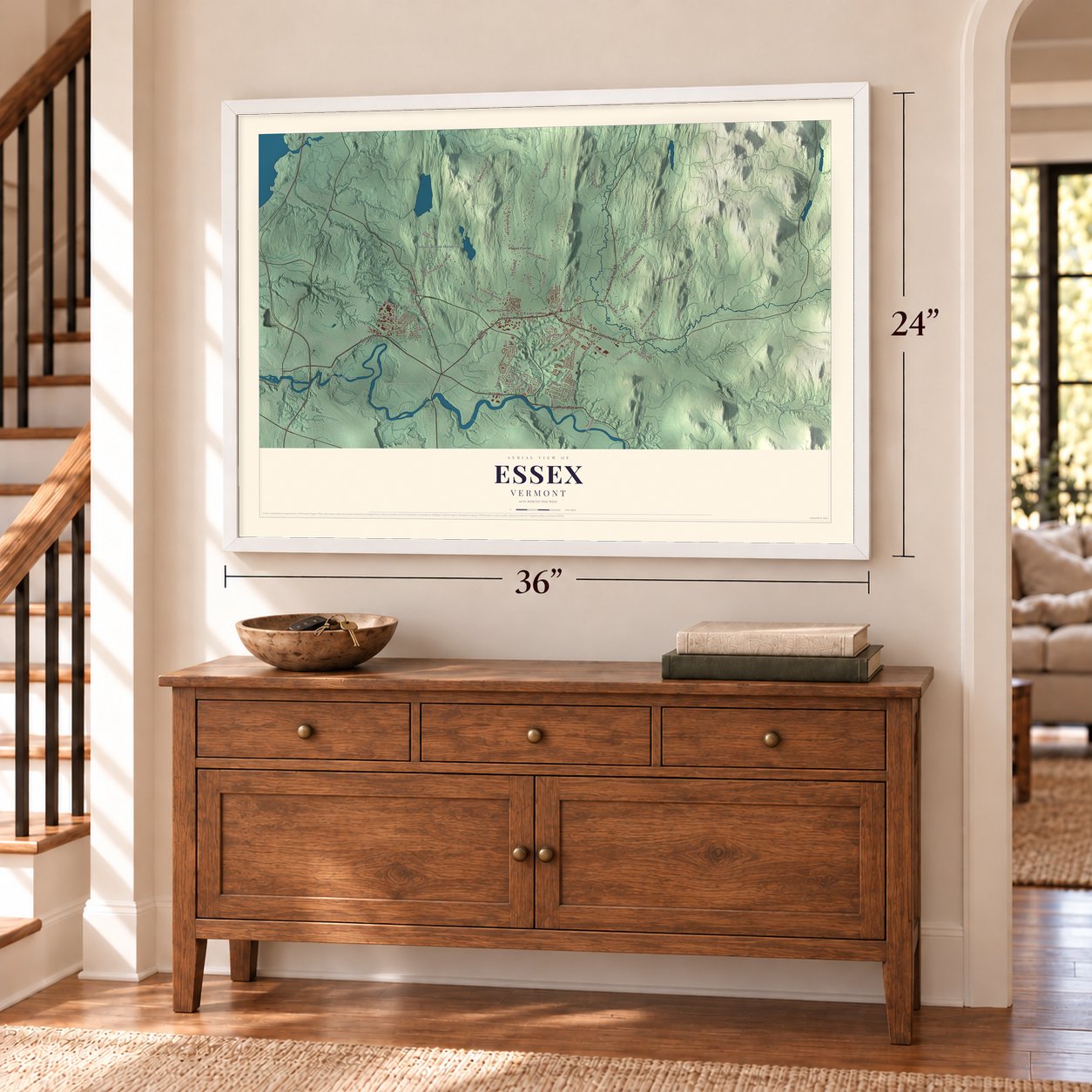 Essex, Vermont map, 24 x 36 inch print in a white frame above a dresser by a staircase