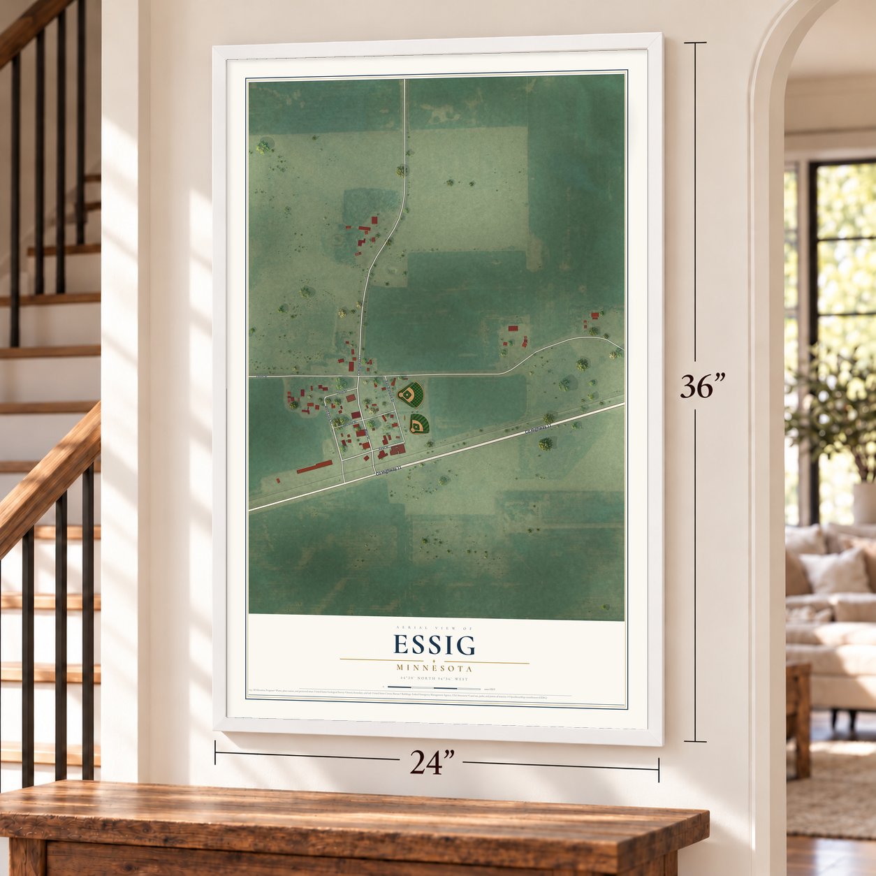 Essig, Minnesota map, 24 x 36 inch print in a white frame by a staircase