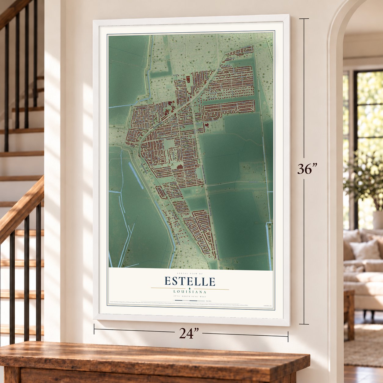 Estelle, Louisiana map, 24 x 36 inch print in a white frame by a staircase