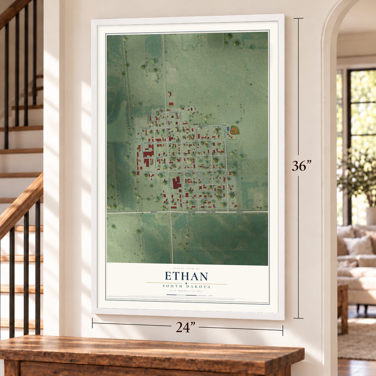 Ethan, South Dakota map, 24 x 36 inch print in a white frame by a staircase