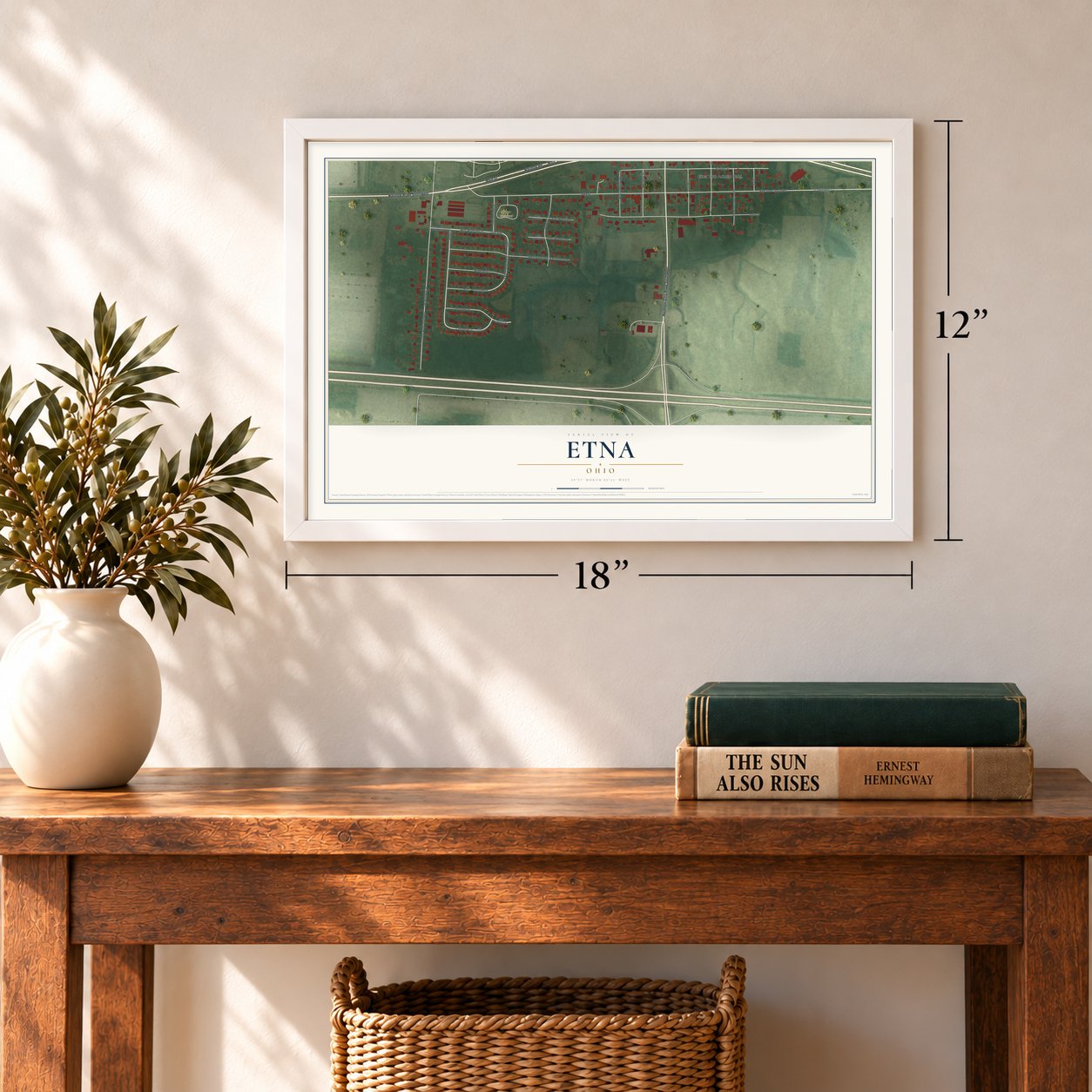 Etna, Ohio map, 12 x 18 inch print in a white frame in an entryway