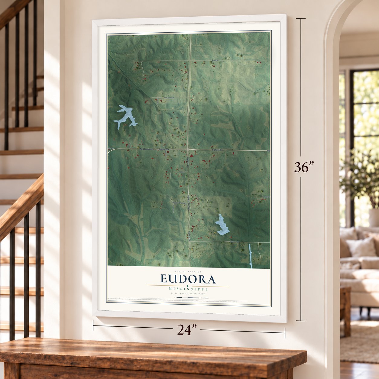 Eudora, Mississippi map, 24 x 36 inch print in a white frame by a staircase