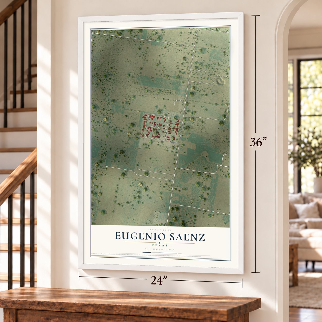 Eugenio Saenz, Texas map, 24 x 36 inch print in a white frame by a staircase