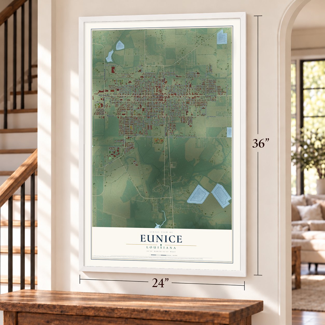 Eunice, Louisiana map, 24 x 36 inch print in a white frame by a staircase