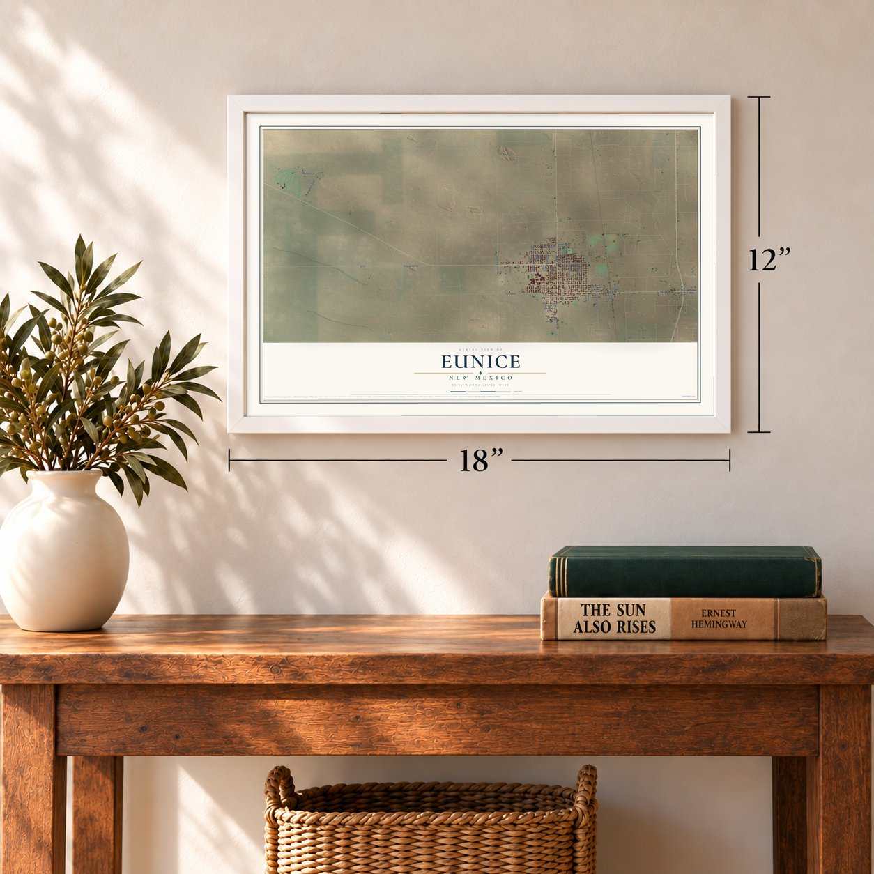 Eunice, New Mexico map, 12 x 18 inch print in a white frame in an entryway
