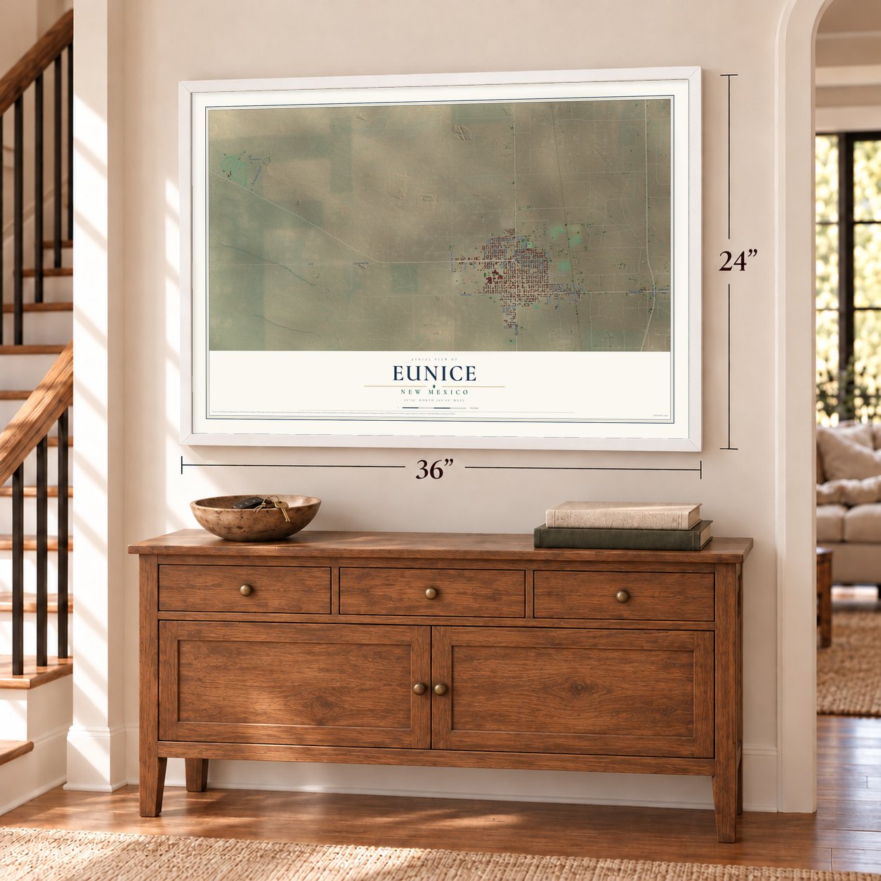Eunice, New Mexico map, 24 x 36 inch print in a white frame above a dresser by a staircase