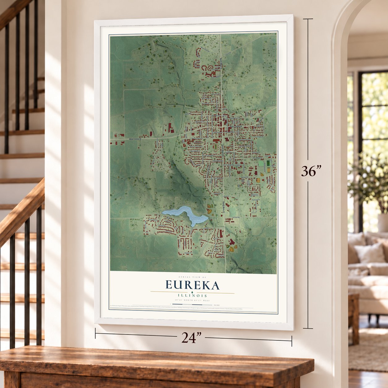 Eureka, Illinois map, 24 x 36 inch print in a white frame by a staircase