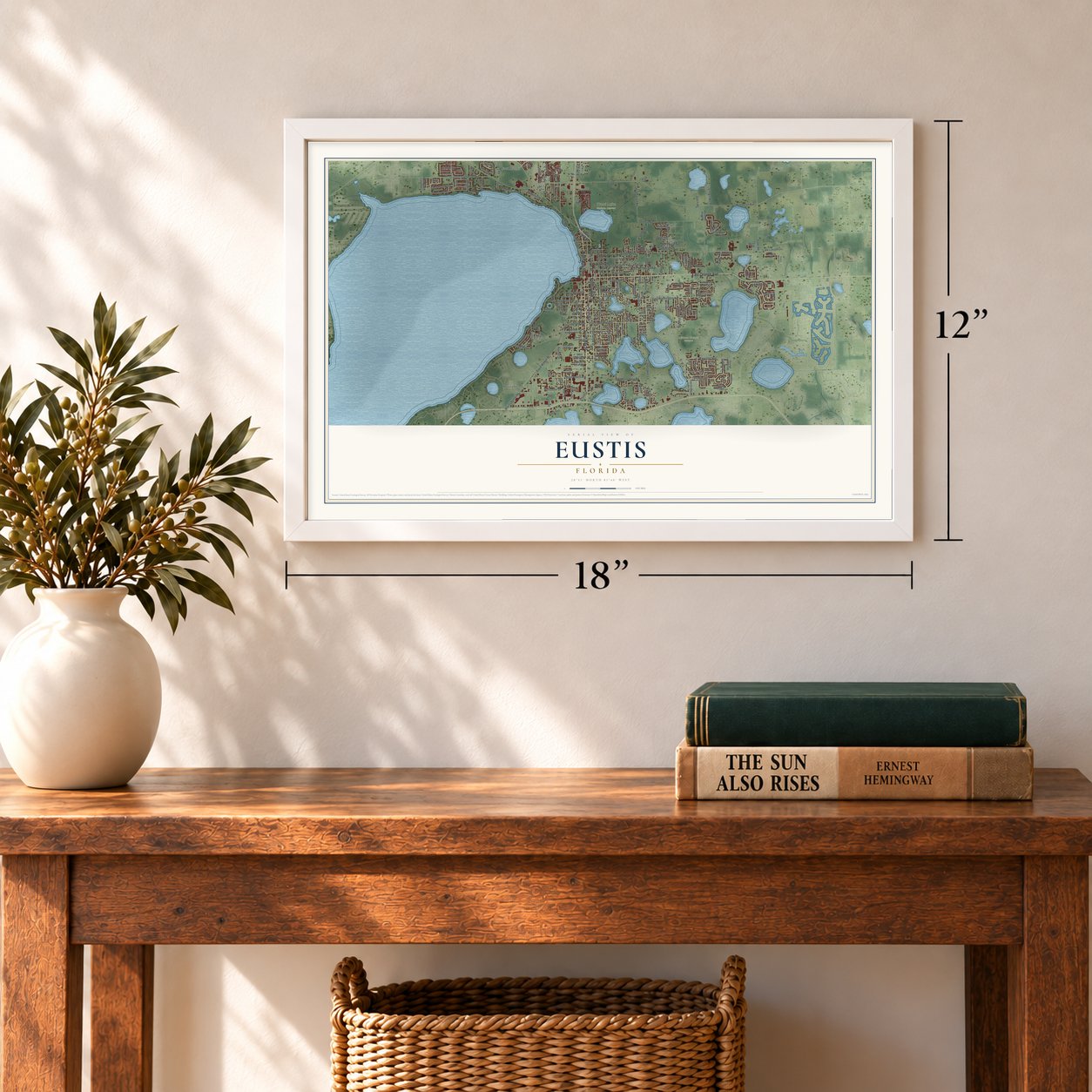 Eustis, Florida map, 12 x 18 inch print in a white frame in an entryway