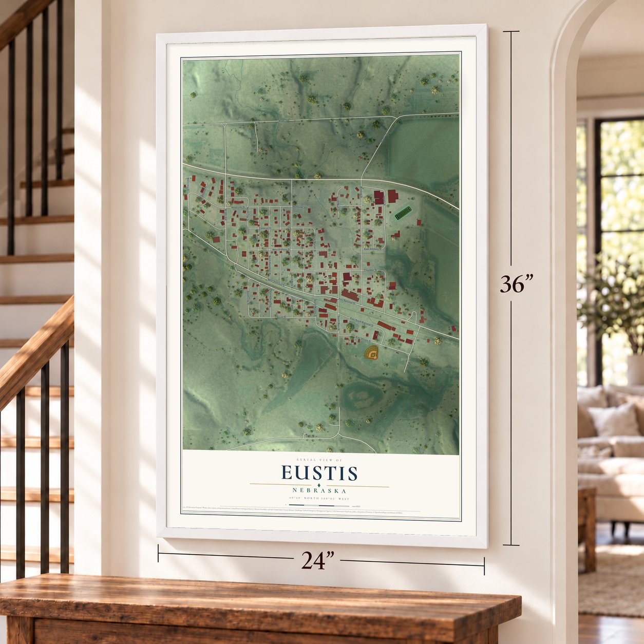 Eustis, Nebraska map, 24 x 36 inch print in a white frame by a staircase