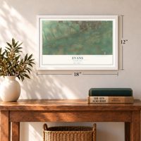 Evans, Colorado map, 12 x 18 inch print in a white frame in an entryway