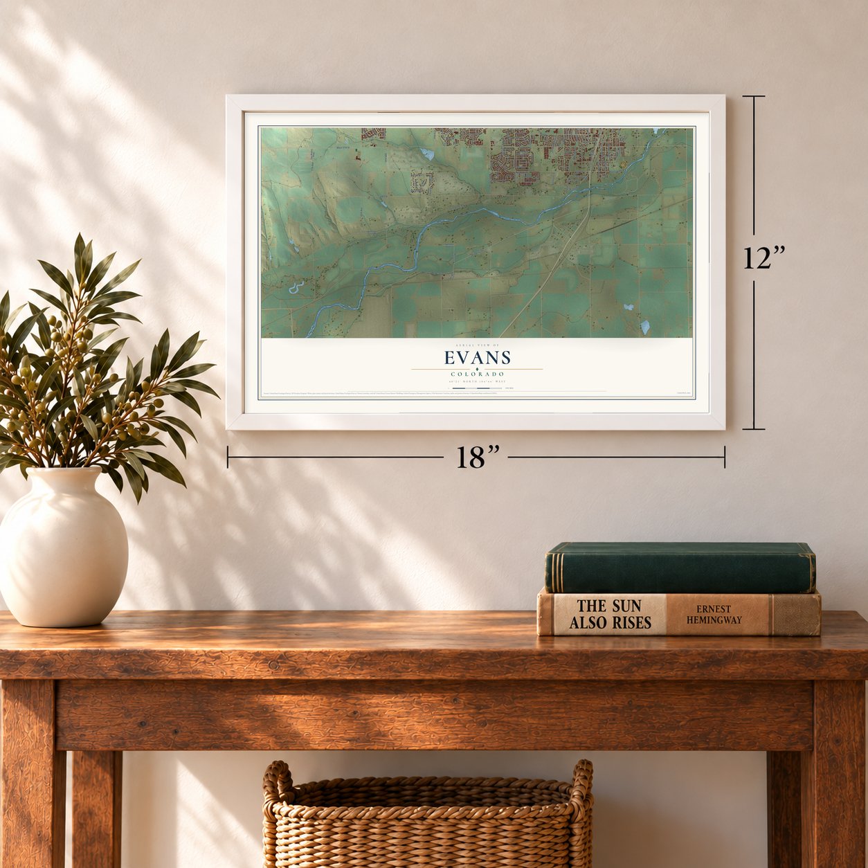 Evans, Colorado map, 12 x 18 inch print in a white frame in an entryway
