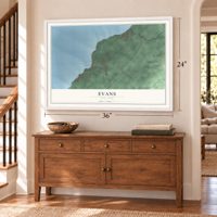 Evans, New York map, 24 x 36 inch print in a white frame above a dresser by a staircase