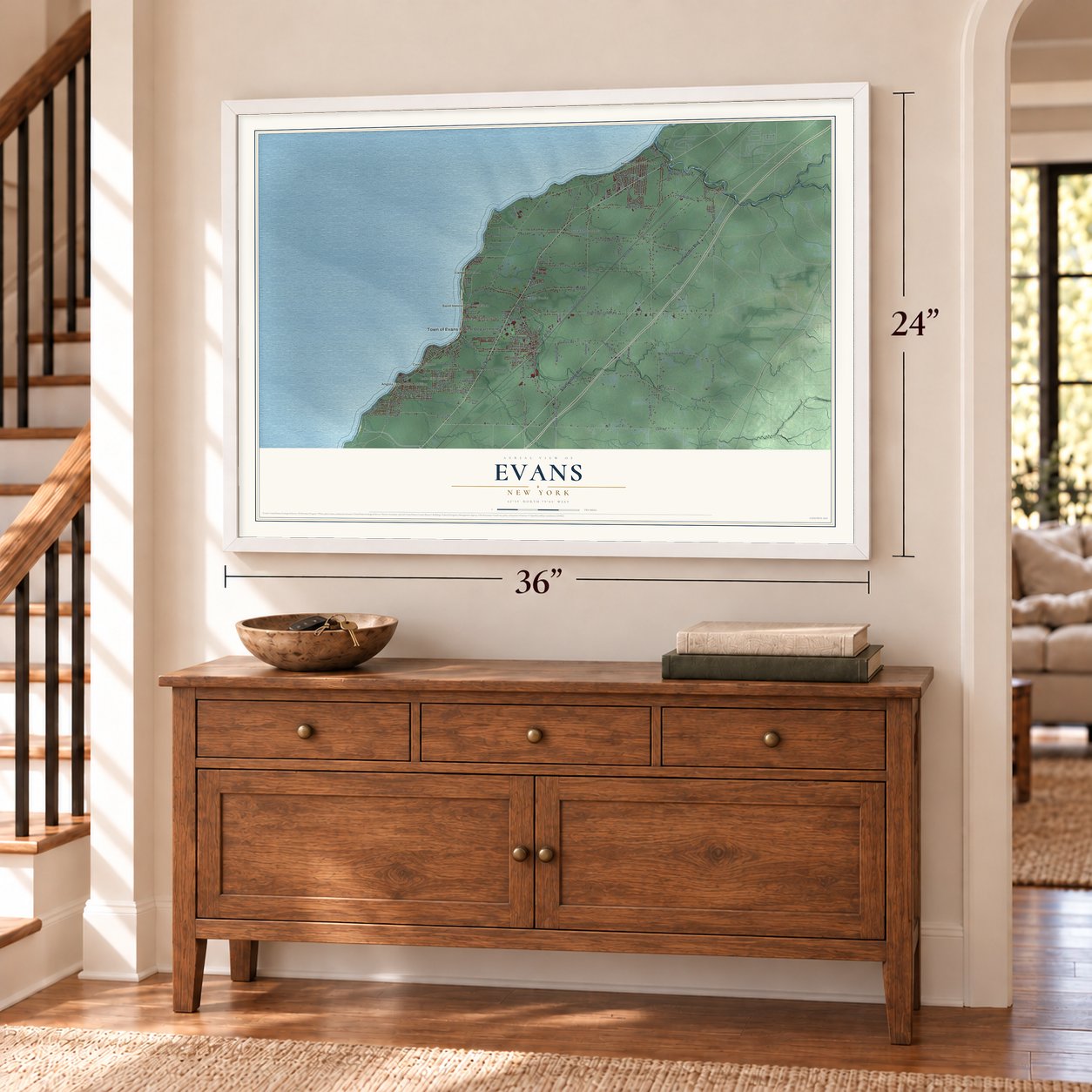Evans, New York map, 24 x 36 inch print in a white frame above a dresser by a staircase