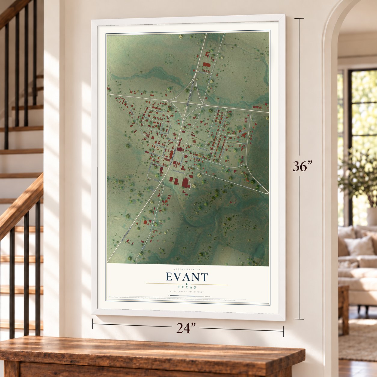 Evant, Texas map, 24 x 36 inch print in a white frame by a staircase