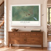 Evart, Michigan map, 24 x 36 inch print in a white frame above a dresser by a staircase