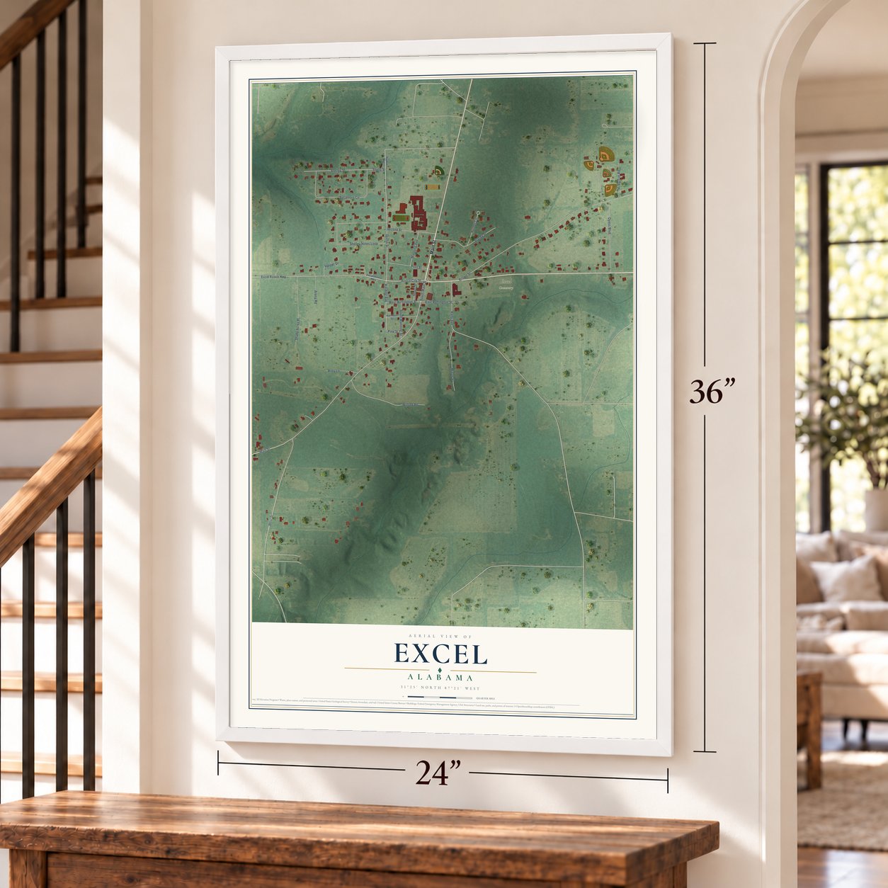 Excel, Alabama map, 24 x 36 inch print in a white frame by a staircase