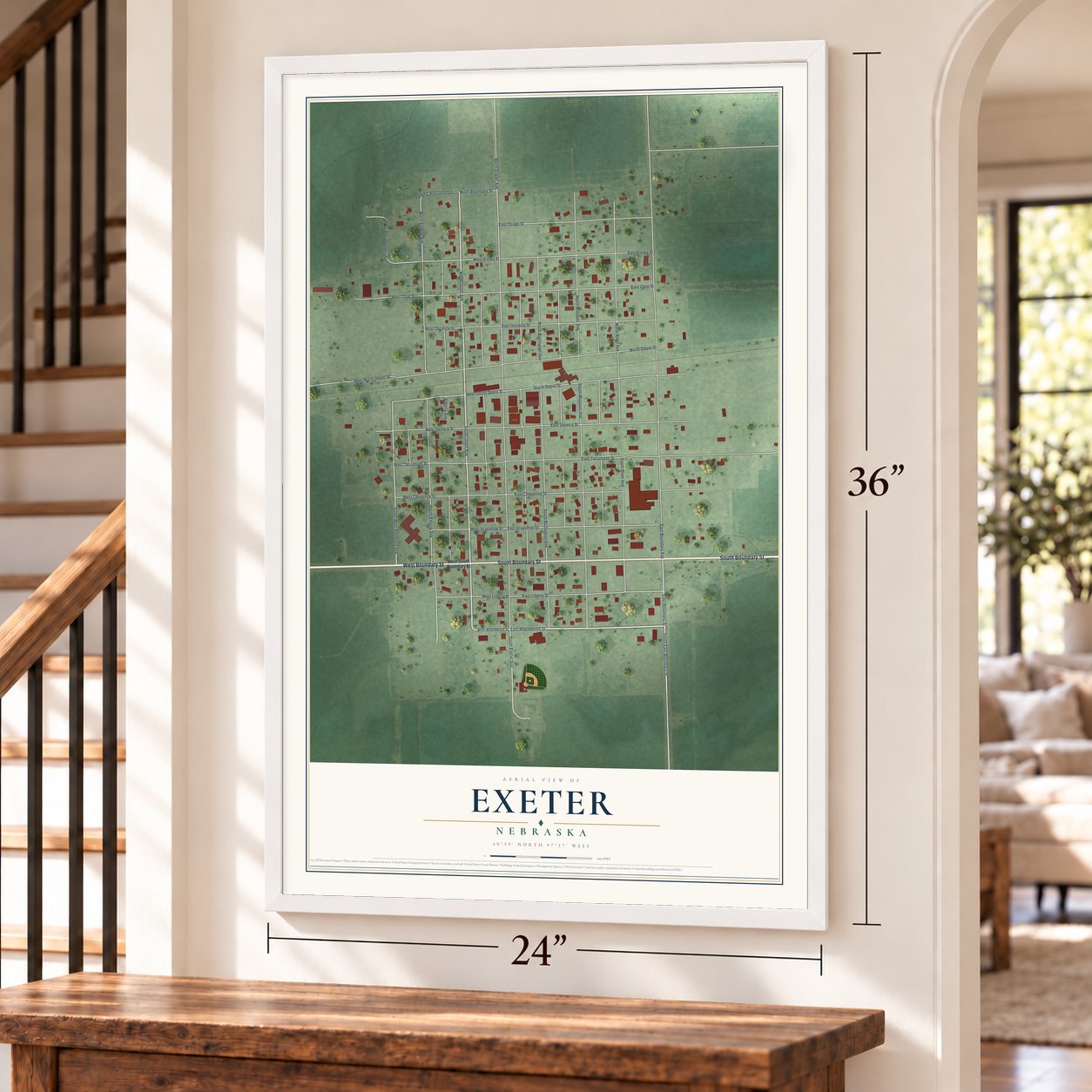 Exeter, Nebraska map, 24 x 36 inch print in a white frame by a staircase