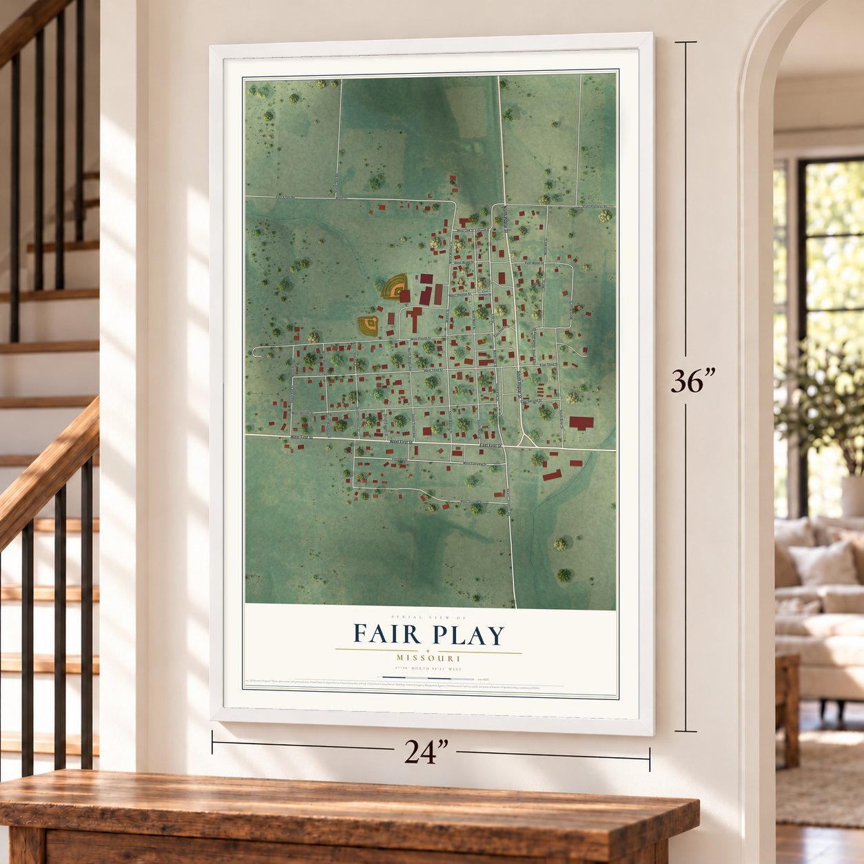 Fair Play, Missouri map, 24 x 36 inch print in a white frame by a staircase