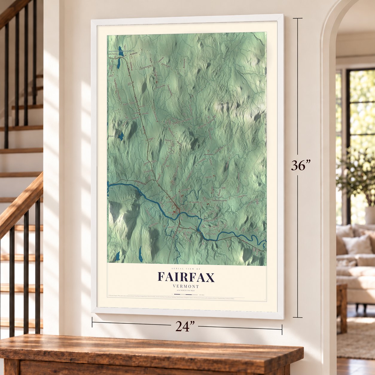 Fairfax, Vermont map, 24 x 36 inch print in a white frame by a staircase