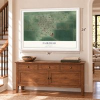 Fairfield, Nebraska map, 24 x 36 inch print in a white frame above a dresser by a staircase