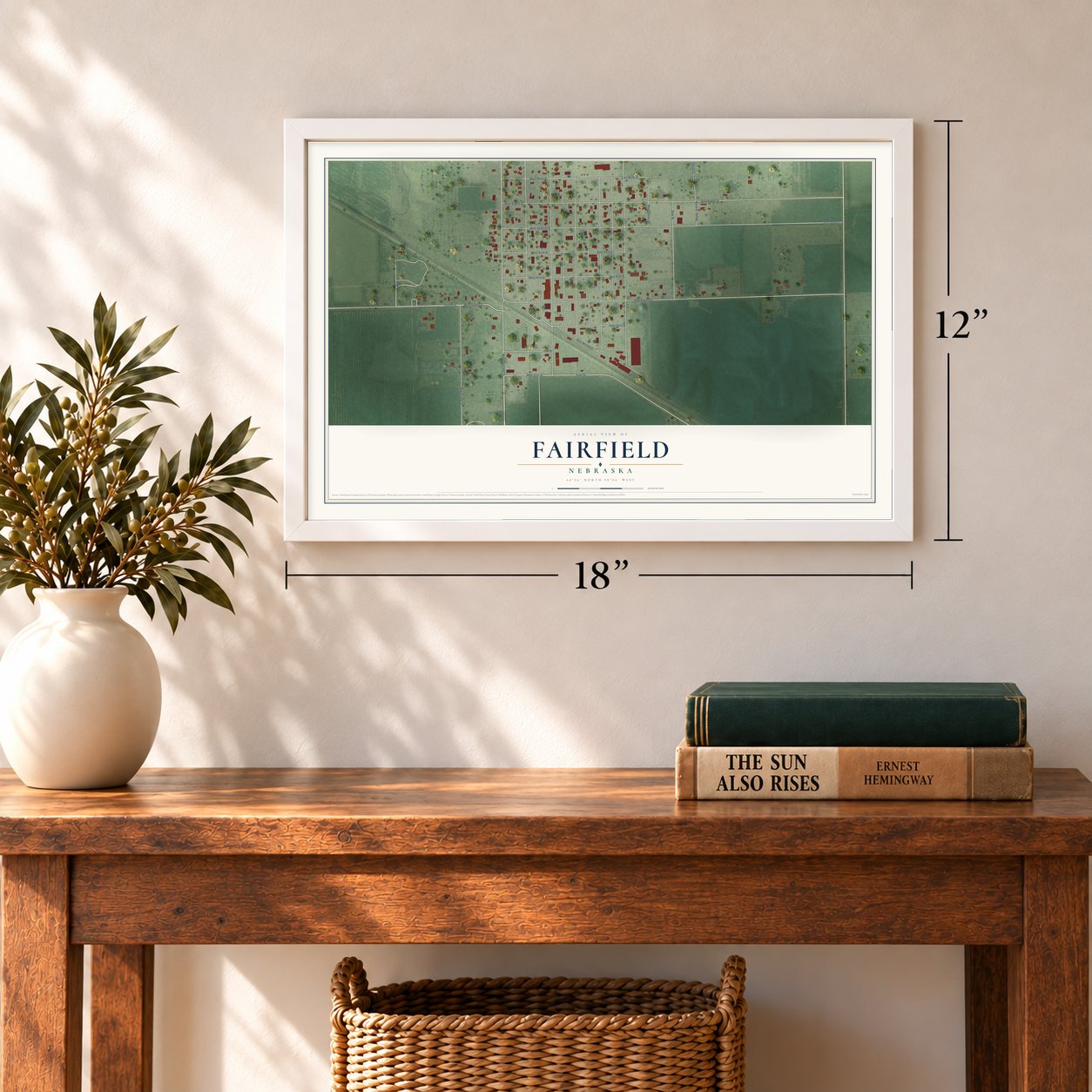 Fairfield, Nebraska map, 12 x 18 inch print in a white frame in an entryway