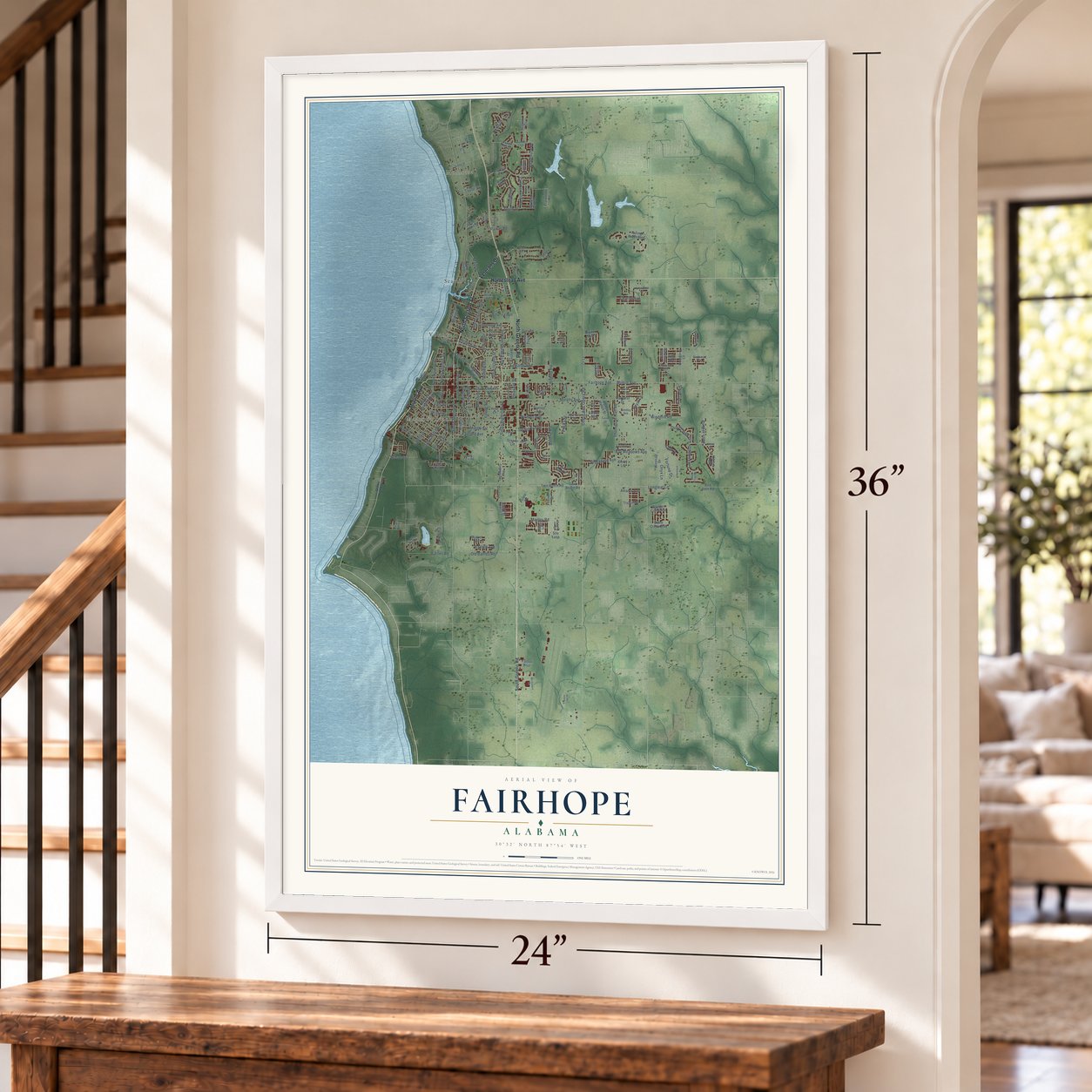 Fairhope, Alabama map, 24 x 36 inch print in a white frame by a staircase