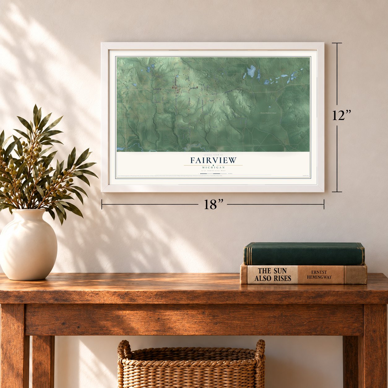 Fairview, Michigan map, 12 x 18 inch print in a white frame in an entryway