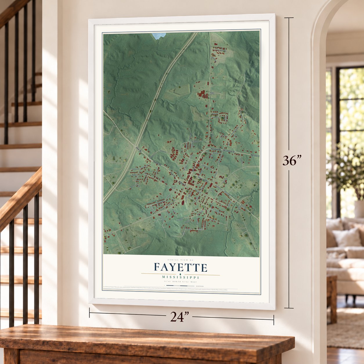 Fayette, Mississippi map, 24 x 36 inch print in a white frame by a staircase