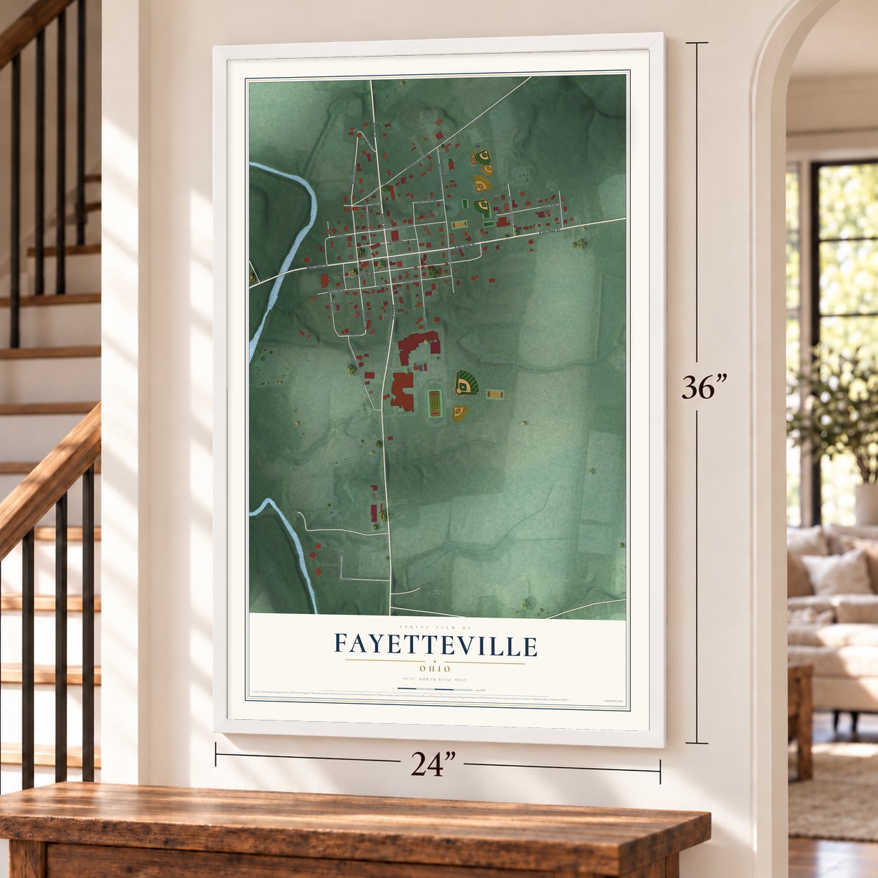Fayetteville, Ohio map, 24 x 36 inch print in a white frame by a staircase