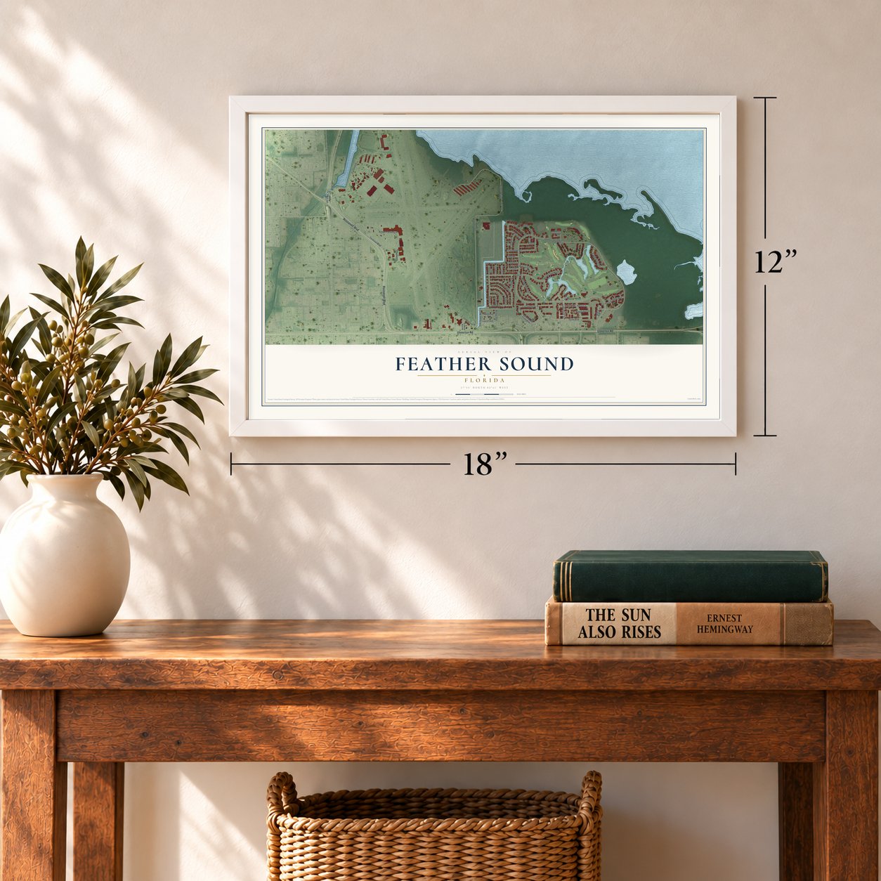 Feather Sound, Florida map, 12 x 18 inch print in a white frame in an entryway