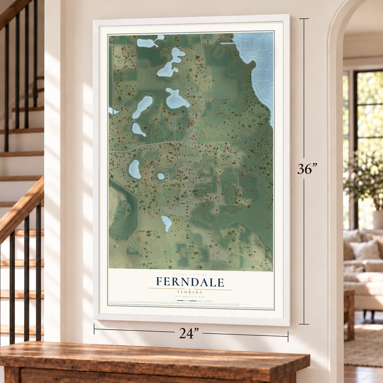 Ferndale, Florida map, 24 x 36 inch print in a white frame by a staircase