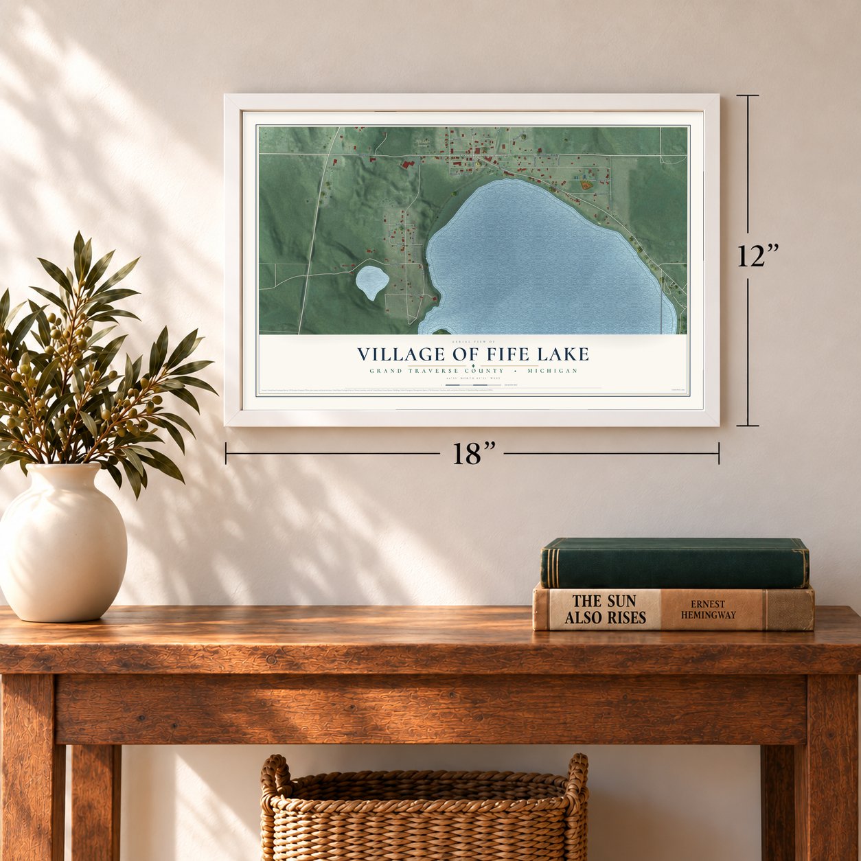 Fife Lake, Michigan map, 12 x 18 inch print in a white frame in an entryway