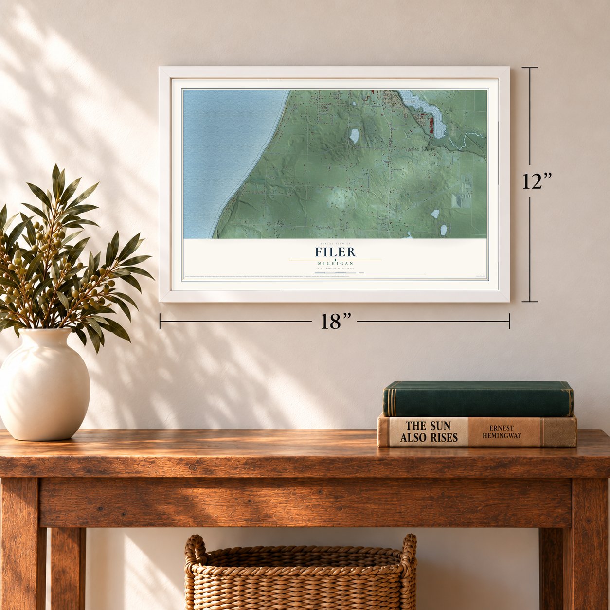 Filer, Michigan map, 12 x 18 inch print in a white frame in an entryway