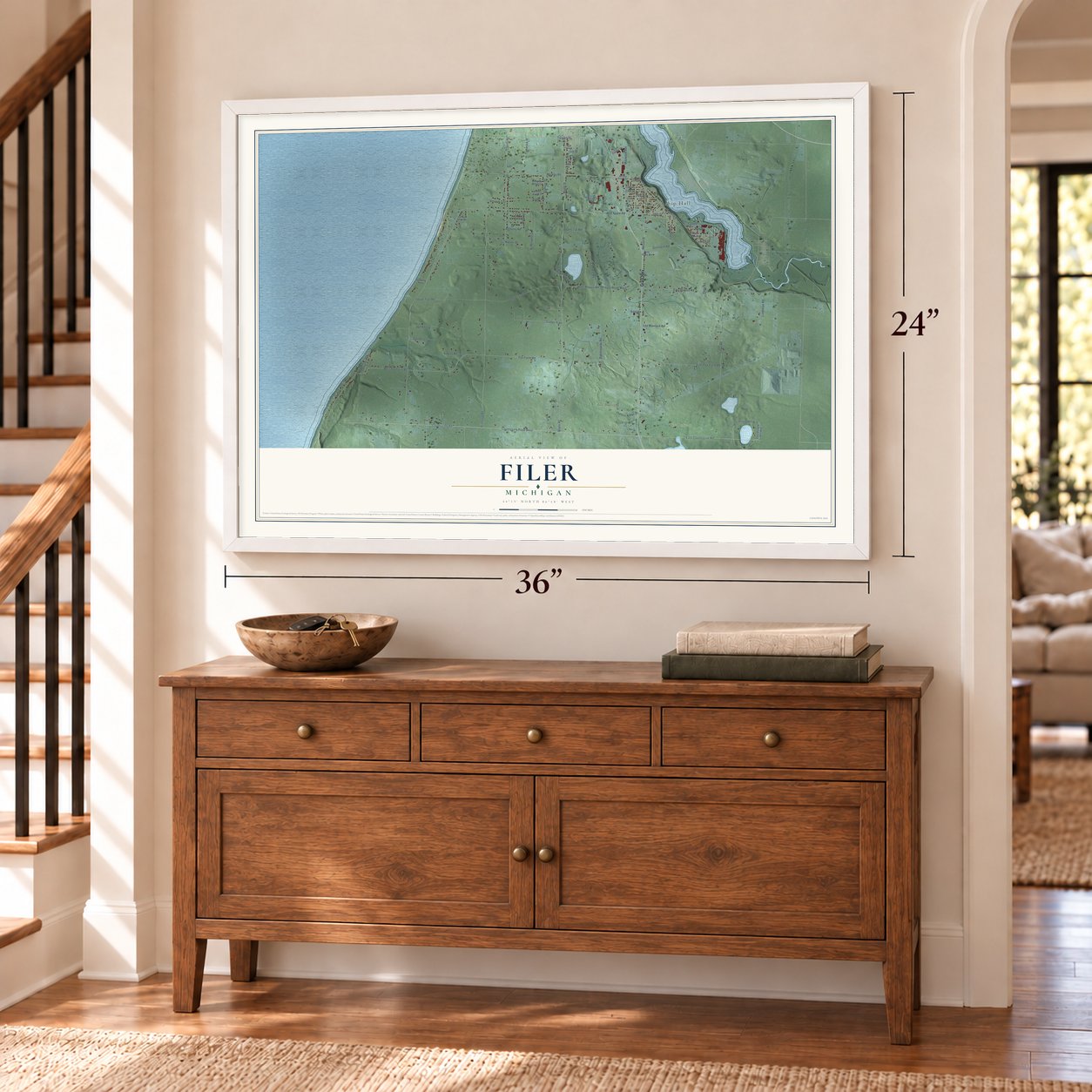 Filer, Michigan map, 24 x 36 inch print in a white frame above a dresser by a staircase