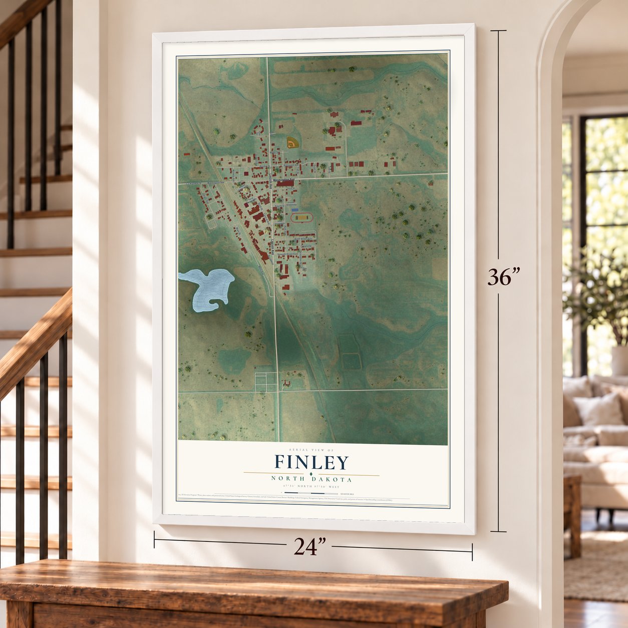 Finley, North Dakota map, 24 x 36 inch print in a white frame by a staircase