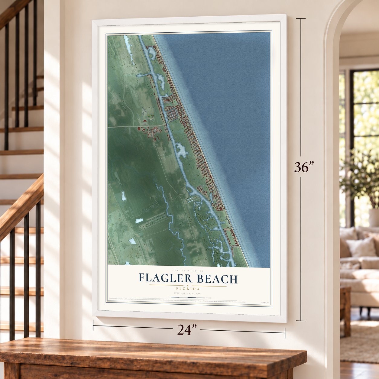 Flagler Beach, Florida map, 24 x 36 inch print in a white frame by a staircase