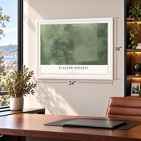 Flagler Estates, Florida map, 18 x 24 inch print in a white frame in a home office