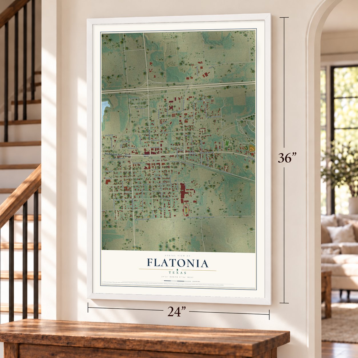 Flatonia, Texas map, 24 x 36 inch print in a white frame by a staircase