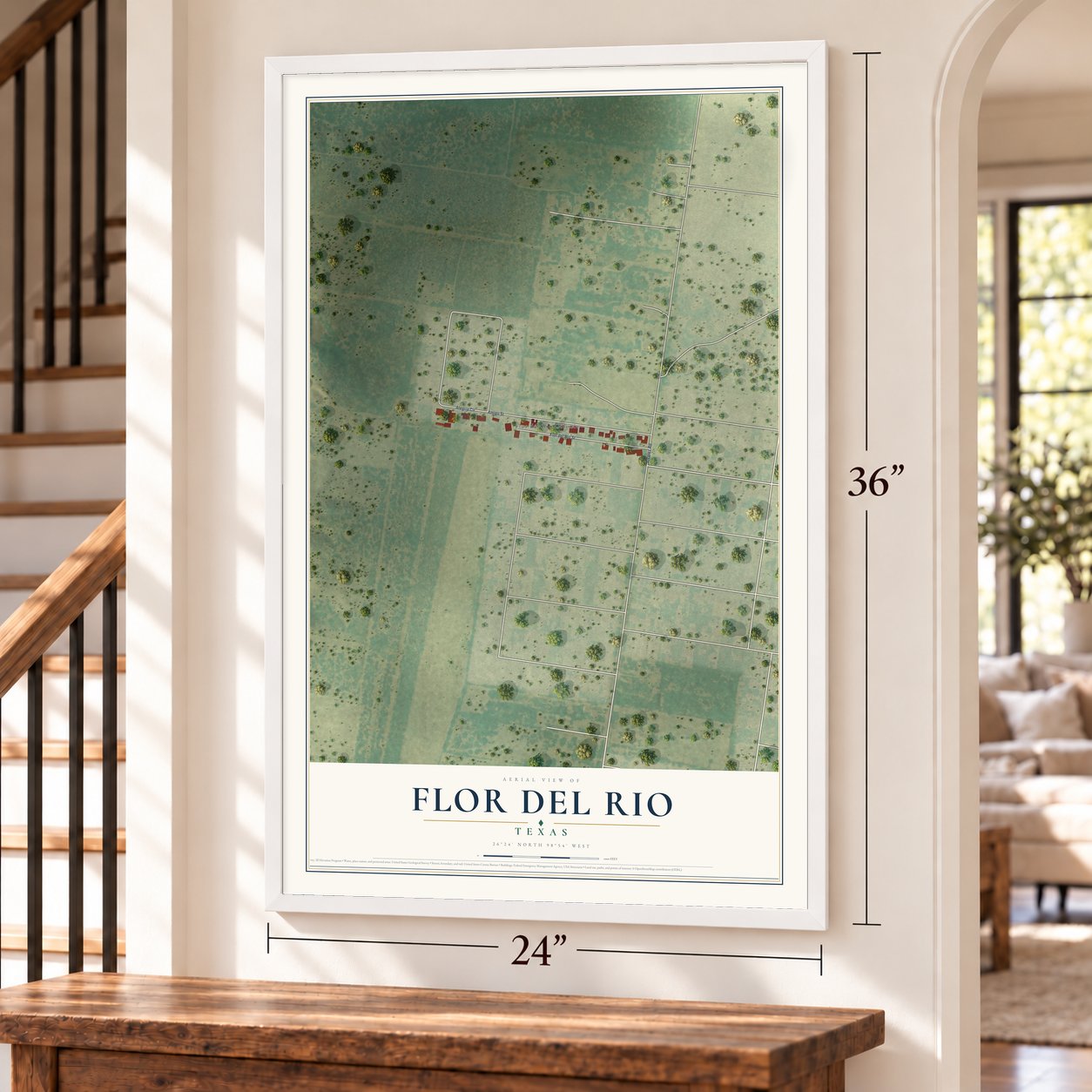Flor del Rio, Texas map, 24 x 36 inch print in a white frame by a staircase