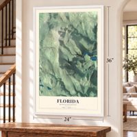 Florida, Massachusetts map, 24 x 36 inch print in a white frame by a staircase