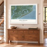 Folly Beach, South Carolina map, 24 x 36 inch print in a white frame above a dresser by a staircase