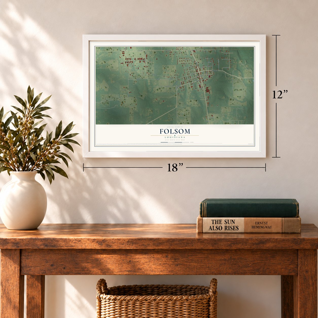 Folsom, Louisiana map, 12 x 18 inch print in a white frame in an entryway