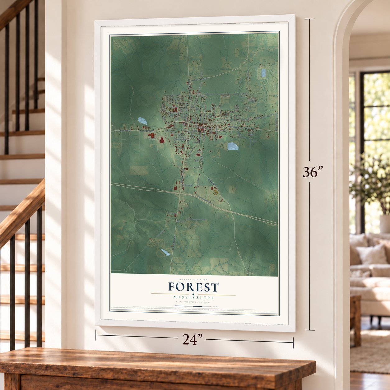 Forest, Mississippi map, 24 x 36 inch print in a white frame by a staircase