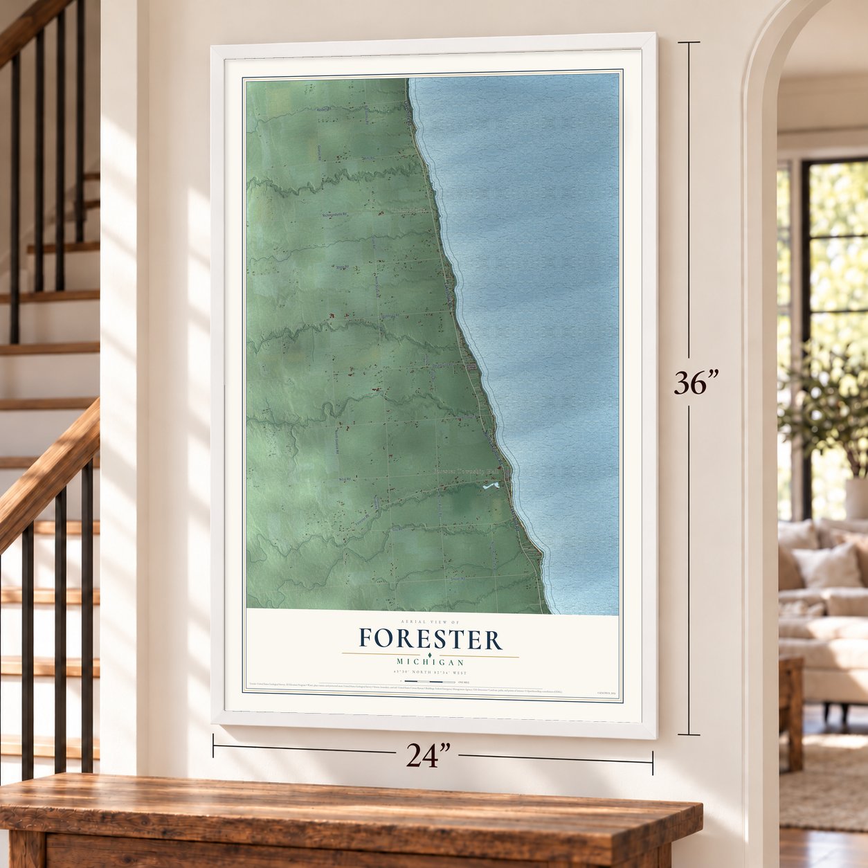 Forester, Michigan map, 24 x 36 inch print in a white frame by a staircase