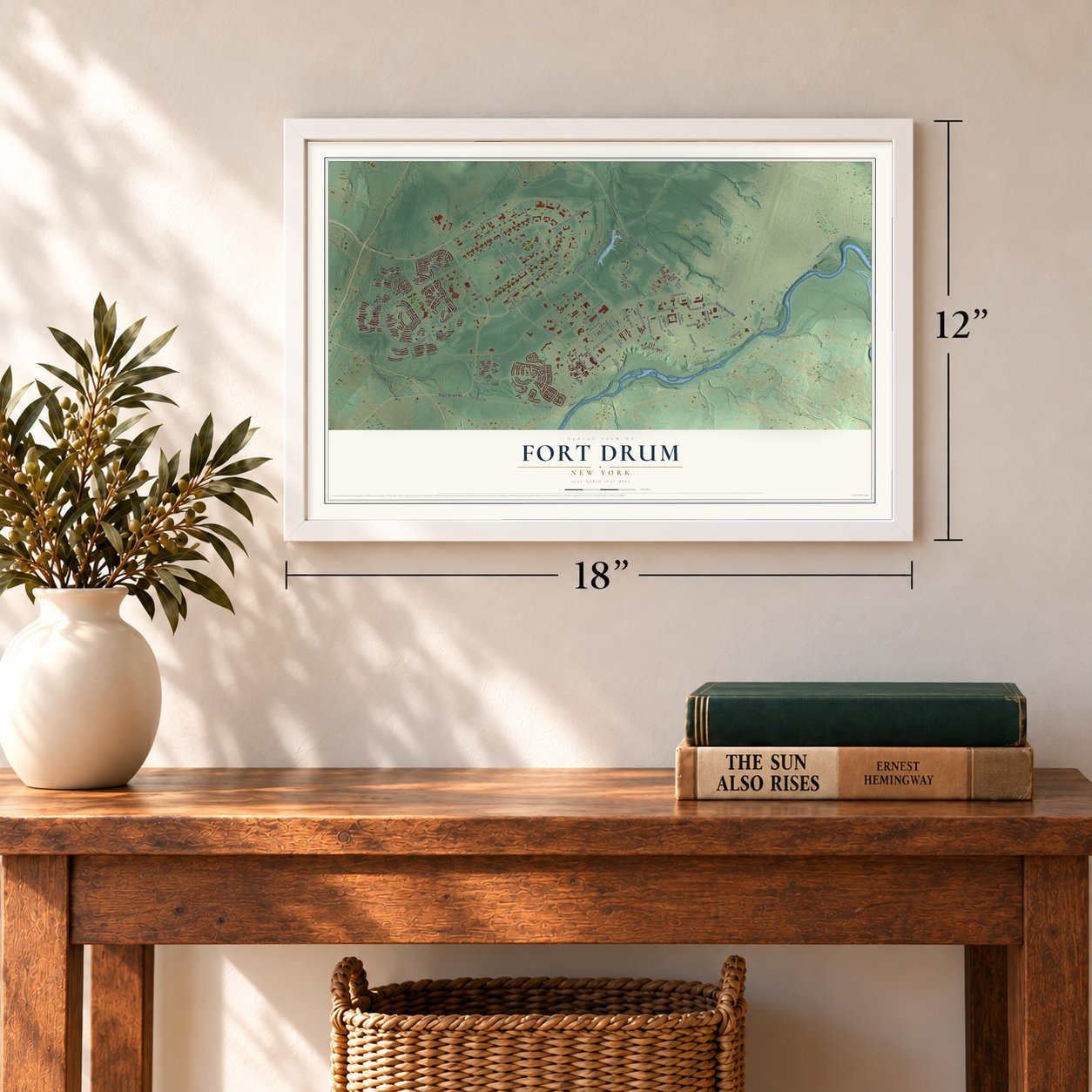 Fort Drum, New York map, 12 x 18 inch print in a white frame in an entryway