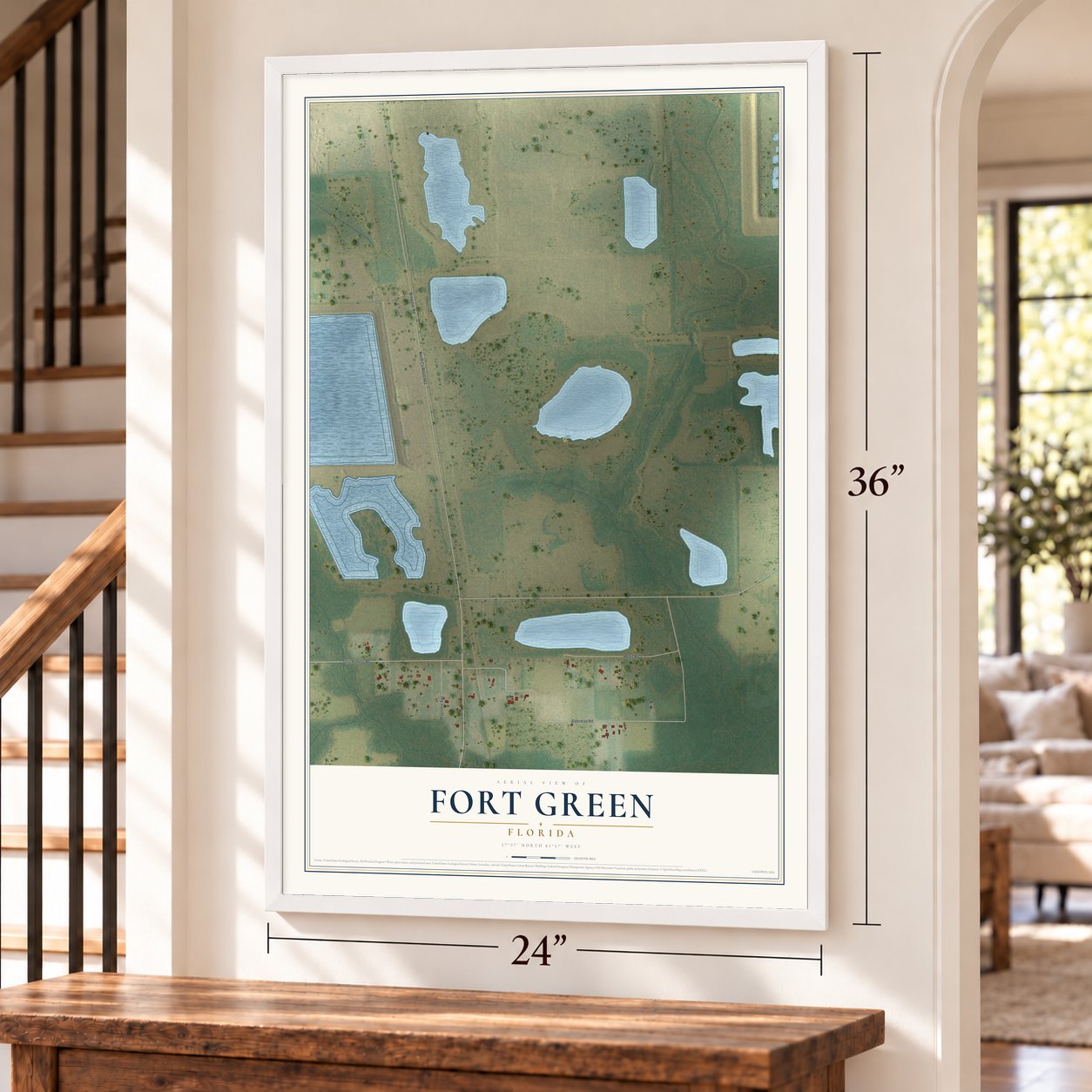 Fort Green, Florida map, 24 x 36 inch print in a white frame by a staircase