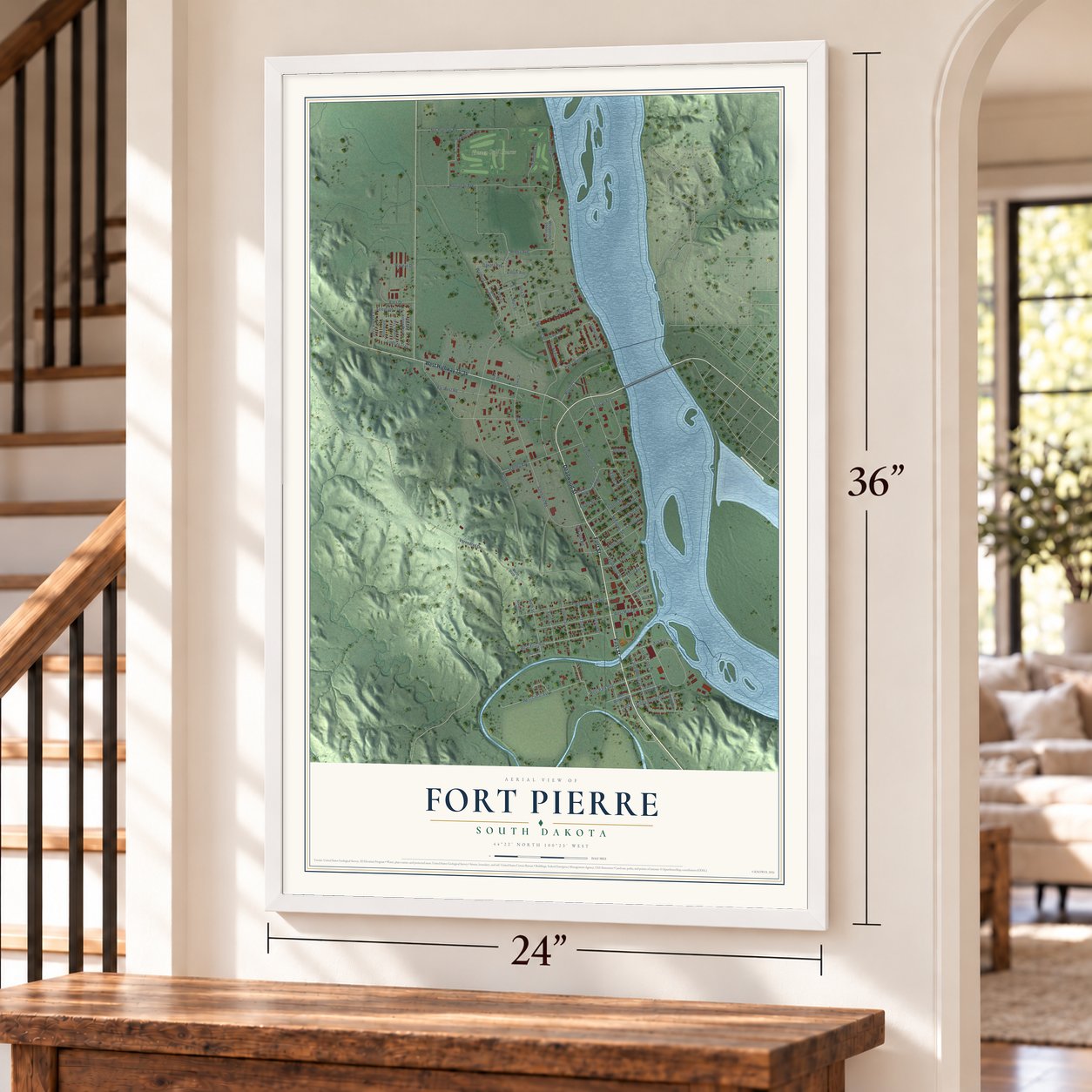 Fort Pierre, South Dakota map, 24 x 36 inch print in a white frame by a staircase