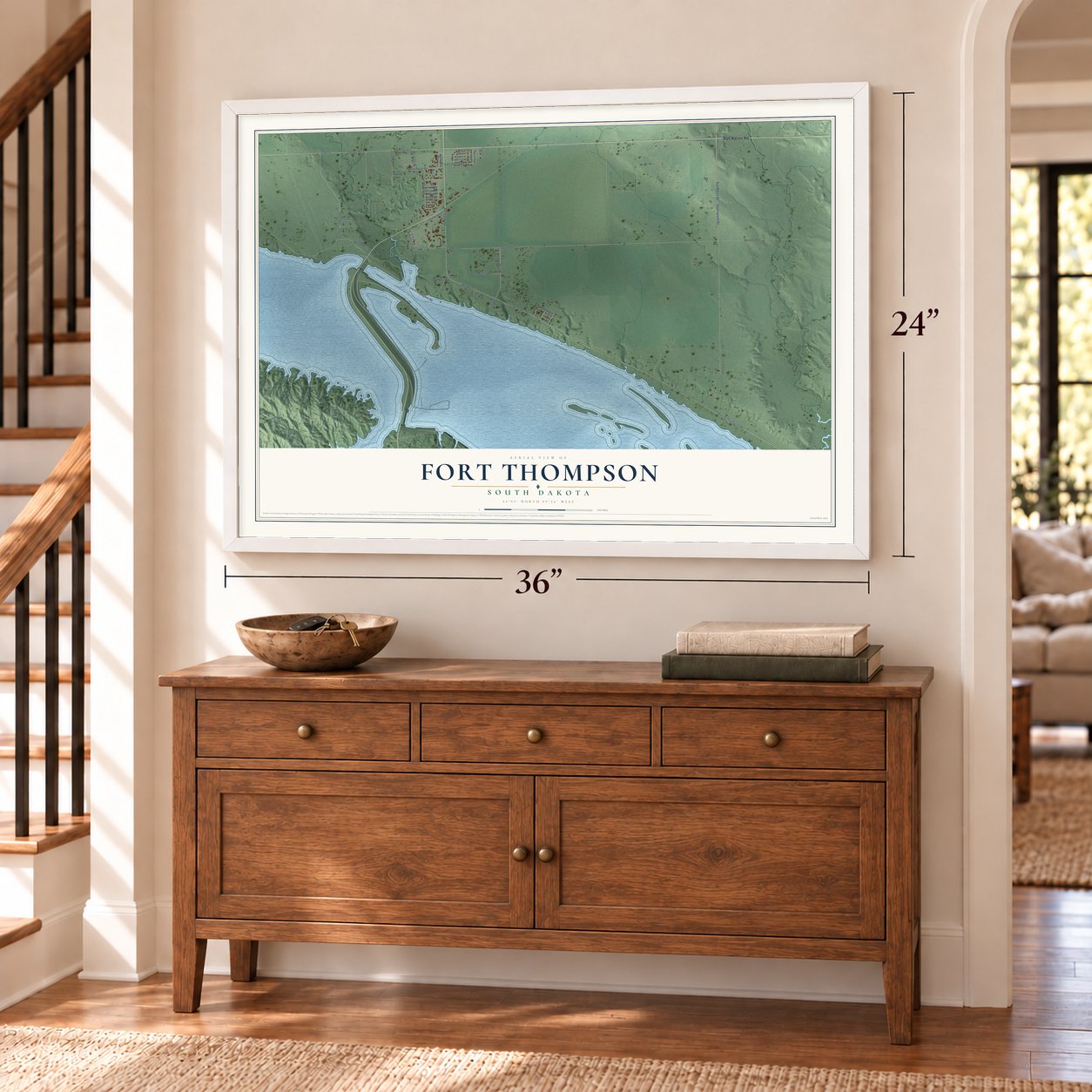 Fort Thompson, South Dakota map, 24 x 36 inch print in a white frame above a dresser by a staircase
